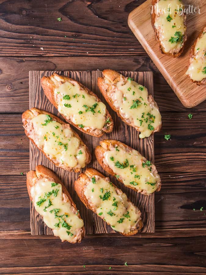 Tuna melt bruschetta is easy and delicious Italian inspired appetizer and snack. Cheesy, creamy and savory tuna topped baguette.