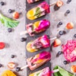 Rainbow fruit popsicles are great sweet dessert for the hot weather. You can taste various fruits in one stick. It's also great for healthy children snack.