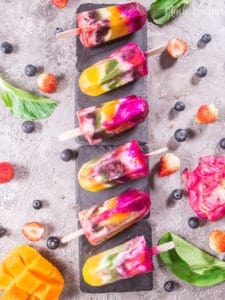 Rainbow fruit popsicles are great sweet dessert for the hot weather. You can taste various fruits in one stick. It's also great for healthy children snack.