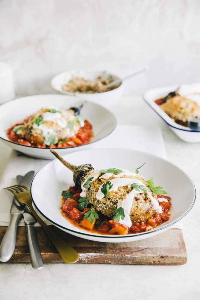 Eggplant stuffed with buckwheat, feta cheese and served with light tomato sauce. Wonderful, healthy vegetarian main dish recipe that's easy to make.