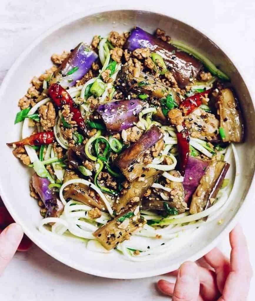 Paleo Chinese Eggplant in Garlic Sauce with buttery and melt-in-your-mouth eggplants, braised in a garlic sauce. This eggplant recipe is vinegary, naturally sweet, and savory, plus it’s Paleo, Whole30, and gluten-free.