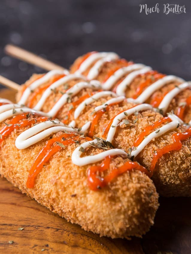 Corn dog is a sausage on a stick that coated in a thick layer of batter and breadcrumbs. It is great for appetizer and afternoon snacks.