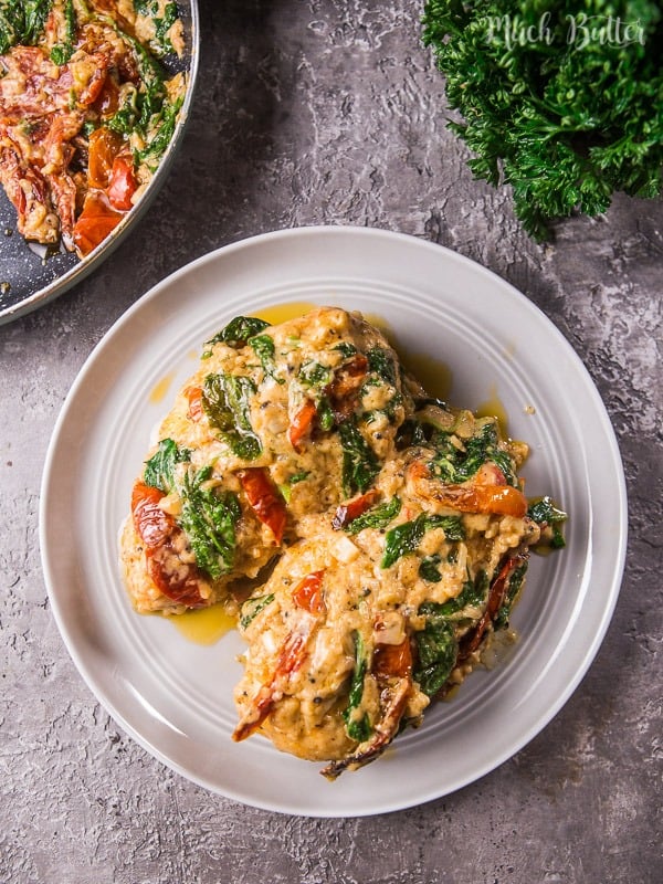 Chicken with spinach and sun dried tomatoes parmesan sauce is an easy simple recipe despite the long name! Try to make this delicious meal for your loved ones.