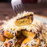 Chocolate cheese fried yellow plantain is an Indonesia dessert/snack. It's topped with chocolate sprinkles, shredded cheddar cheese, and sweetened condensed milk. The sweet and legit taste is very popular among Indonesian people.