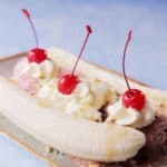 Want to make easy homemade dessert? Try this banana split! Loaded with banana, ice creams, crushed peanuts, and caramel sauce.