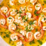 Do you want an easy unique appetizer? Let’s make popular Gambas al Ajillo or Spanish Garlic Shrimp. It is a classic tapas dish in Spain. It consists of succulent shrimp with a spicy and garlicky sauce. Perfect with some crusty bread!