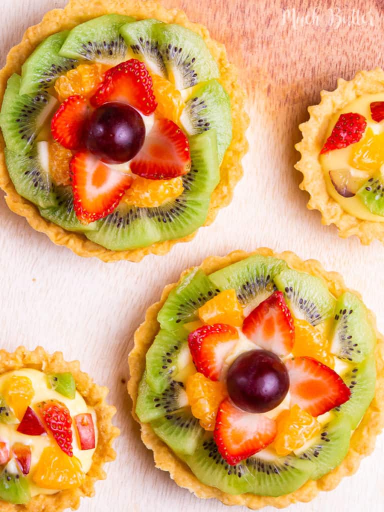 Here's a beautiful Fruit Pastry Cream Tart! You won't resist the fresh and colorful fruits mix with rich pastry cream in a crispy pastry crust. This classic elegant dessert will impress your friend and family. Surprisingly, it is easy to prepare!
