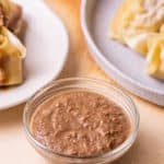 Easy and quick spicy peanut sauce as dips or dressing for perfect dishes. It's creamy, savory, and a little spicy. Delish peanut sauce of Asian flavor. Finger-licking good!