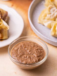 Easy and quick spicy peanut sauce as dips or dressing for perfect dishes. It's creamy, savory, and a little spicy. Delish peanut sauce of Asian flavor. Finger-licking good!