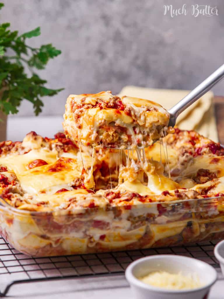 Classic Lasagna with bechamel sauce is the lovely comfort food for family and friends' dinner gatherings! Flavorful layered pasta with rich bolognese meat sauce, white bechamel sauce, and full of melted cheese.
