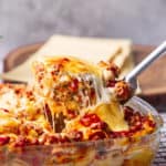 Classic Lasagna with bechamel sauce is the lovely comfort food for family and friends’ dinner gatherings! Flavorful layered pasta with rich bolognese meat sauce, white bechamel sauce, and full of melted cheese.