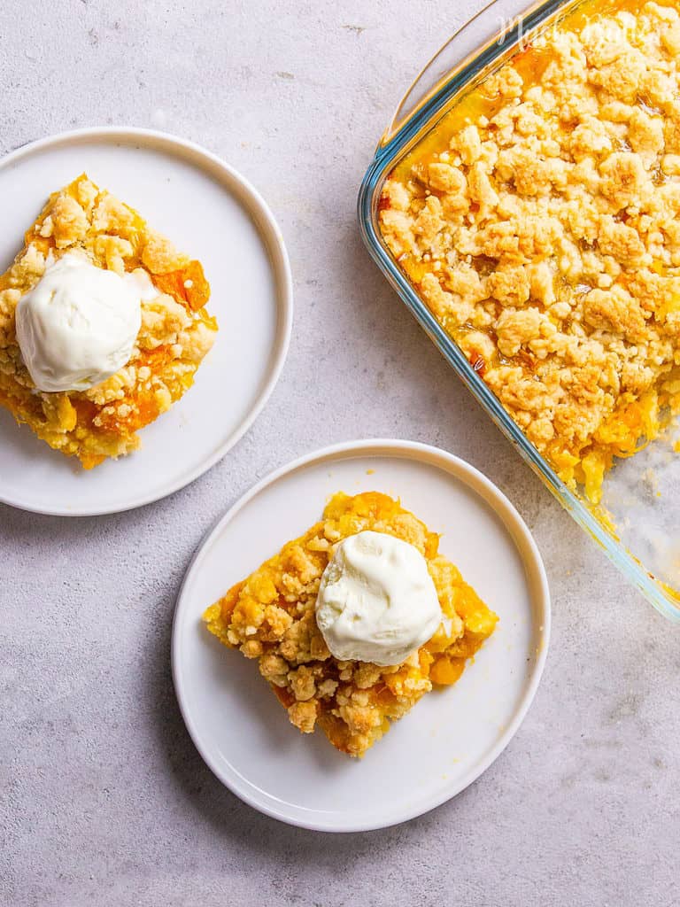 Enjoy the fruity & sweet mango crumbles to load tropical flavor! It is a sweet snack with fresh mangoes, lemon dash, and easy homemade crumbles. Perfect crumbly, crispy, rich, and vegan snack for your summer!