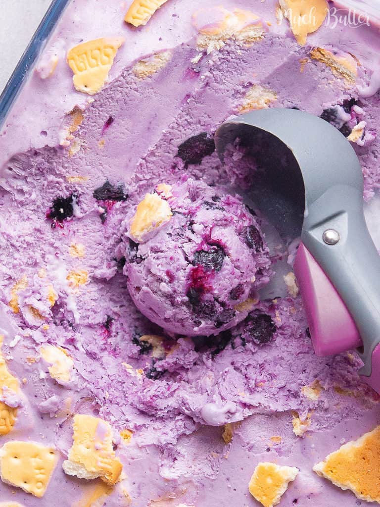 A Blueberry Cheesecake Ice Cream for a delightful treat in every spoon. Fresh blueberry in a mix of creamy cheesecake and graham crackers will cool off your day. Easy to try, you won't make this decadent ice cream once.