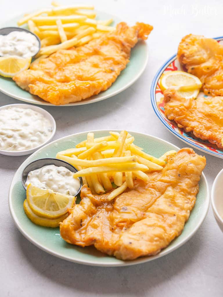 Fish and Chips with Tartar Sauce, Let's make England's favorite national dish! Crispy and golden brown flakey outside and tender inside. Perfect flavorful taste with a serving of crunchy chips and tartar sauce. No need to find the restaurant of fish and chips, just made it at home.