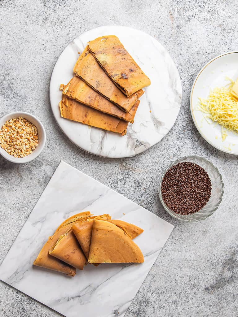 Crispy thin martabak is an Indonesian pancake with a crispy, dry, soft, and thin texture. Easy homemade batter, you can make it quickly for every breakfast. The filling is UNLIMITED, create your own tasty pancake.