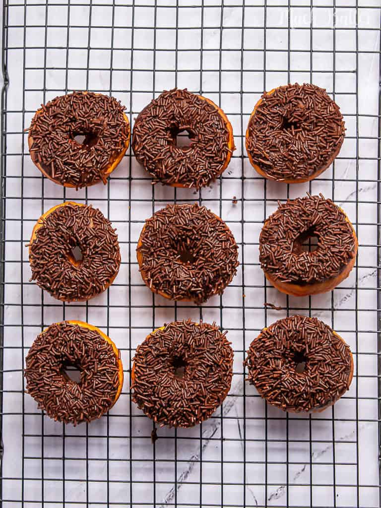 Chocolate sprinkle donuts are stress-free snacks to brighten your day. You can’t eat this sweet, fluffy, and moist donut just one. I bet more 😉