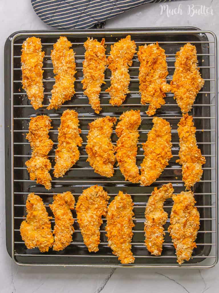 Baked Tortilla Chicken Tenders is crunchy baked chicken tenders with tortilla chips mixed with bread crumbs. The chicken tender will melt in your mouth with its delicacy. Another tempting menu for your lunch!