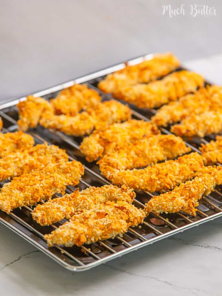 Baked Tortilla Chicken Tenders is crunchy baked chicken tenders with tortilla chips mixed with bread crumbs. The chicken tender will melt in your mouth with its delicacy. Another tempting menu for your lunch!