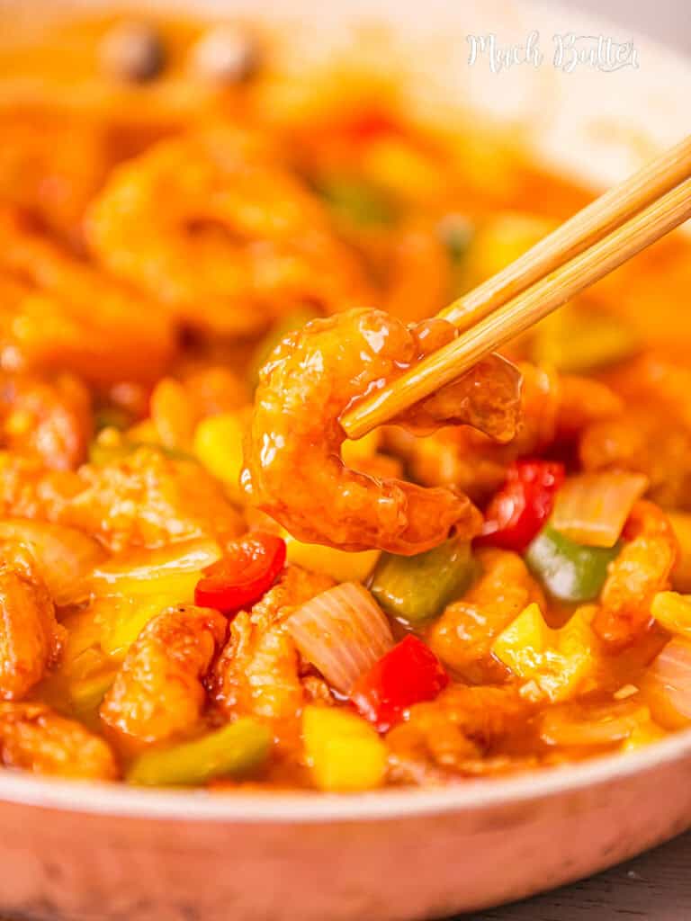 Sweet and Sour Shrimp. Brings a flavourful dish with golden crispy shrimp, bell peppers, and pineapple tossed in sweet and sour sauce.