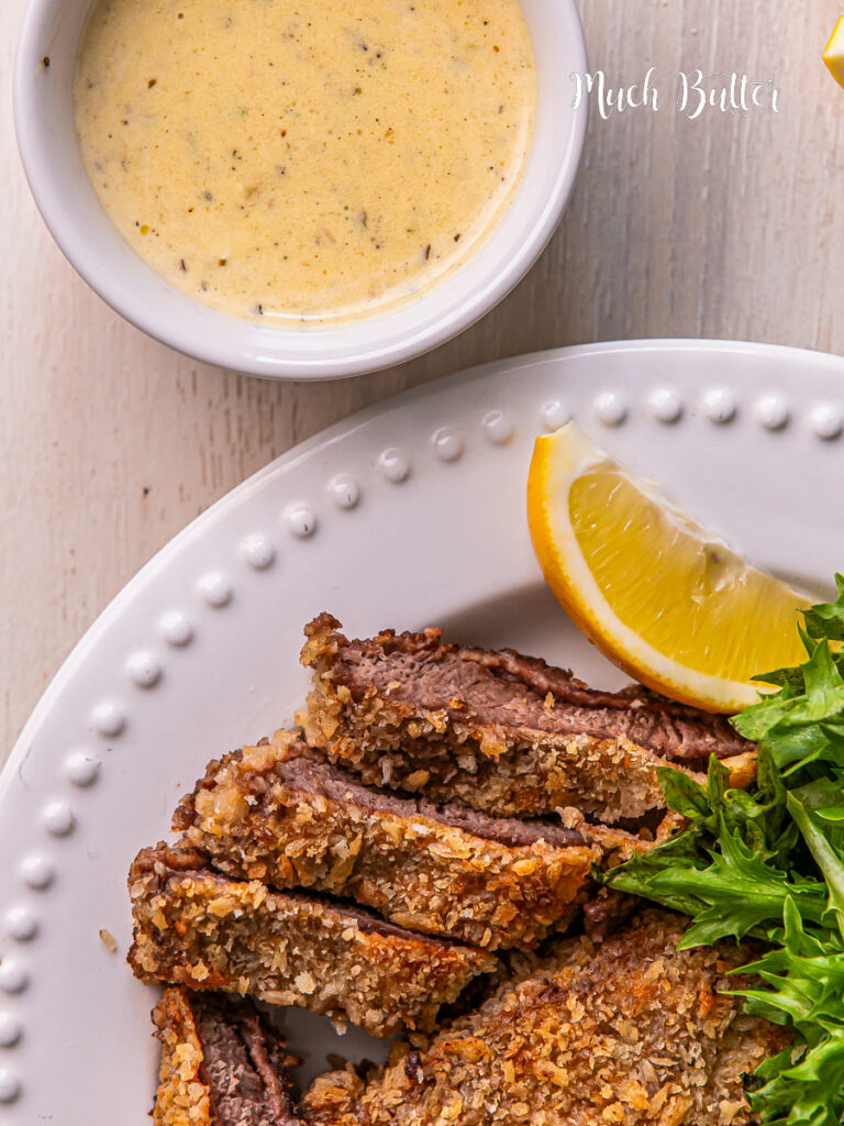 Taste this Beef Schnitzel with Garlic Butter Sauce. A delicious recipe sees perfectly a melt-in-your-mouth beef with a crunchy crumb coating and served with a creamy garlic butter sauce. 