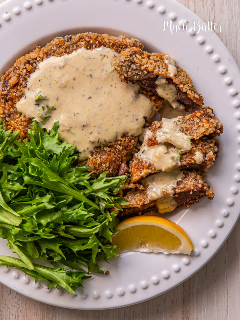 Taste this Beef Schnitzel with Garlic Butter Sauce. A delicious recipe sees perfectly a melt-in-your-mouth beef with a crunchy crumb coating and served with a creamy garlic butter sauce. 