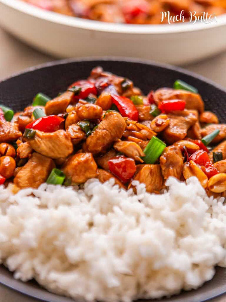 Making Chinese Kung Pao Chicken has never been this easy.  a spicy symphony of tender chicken, crunchy peanuts, and vibrant veggies on warm rice. 