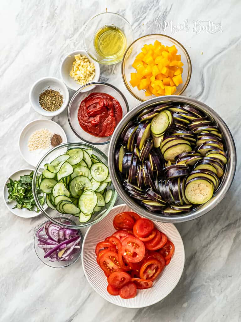 Ratatouille is a simple dish of layered Eggplant and zucchini simmered with tomatoes, caramelized onions, and garlic until tender and juicy!