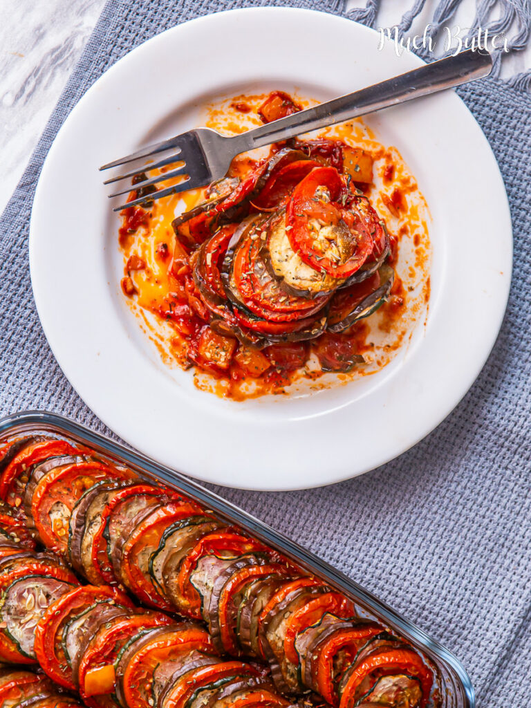 Ratatouille is a simple dish of layered Eggplant and zucchini simmered with tomatoes, caramelized onions, and garlic until tender and juicy!