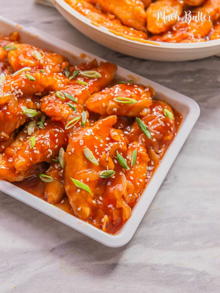 Make these sweet and sour chicken tenders at home! A fantastic crispy chicken bites bathed in a vibrant, tangy-sweet sauce.