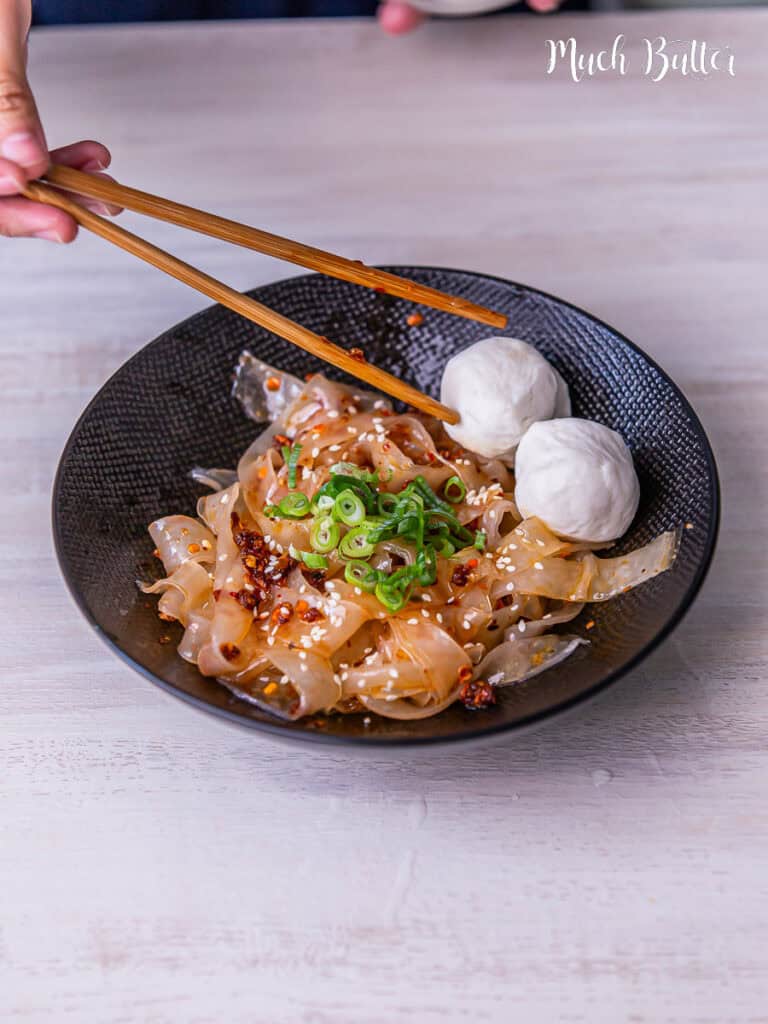 Discover the perfect fusion of Rice Paper Noodle tossed in Chili Oil! Where chewy rice paper noodles meet a chili oil sauce, it's gluten-free!