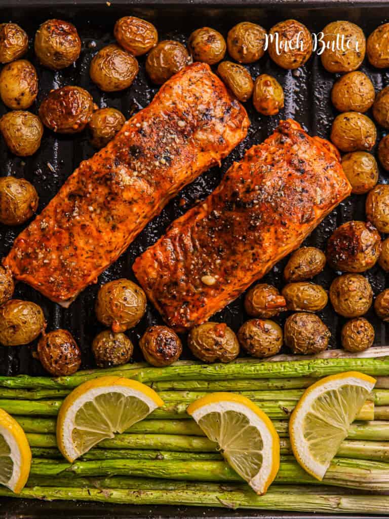 Sheet-pan roasted Salmon and Vegetable with creamy parmesan garlic sauce is your answer! Finish this simple, all-in-one sheet pan dinner.