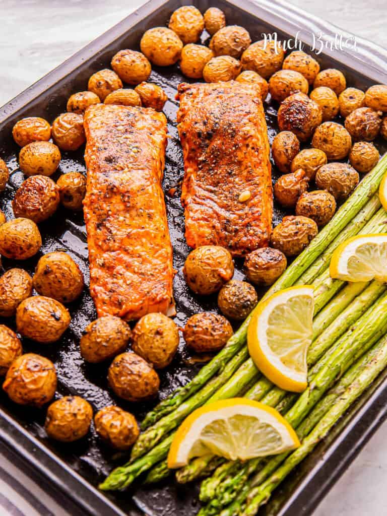 Sheet-pan roasted Salmon and Vegetable with creamy parmesan garlic sauce is your answer! Finish this simple, all-in-one sheet pan dinner.