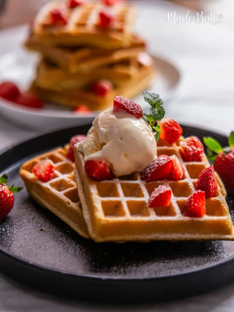 This simple Belgian waffle recipe is your answer! it has a crispy exterior and a light, fluffy interior! Top the waffles with berries, ice cream & sugar!