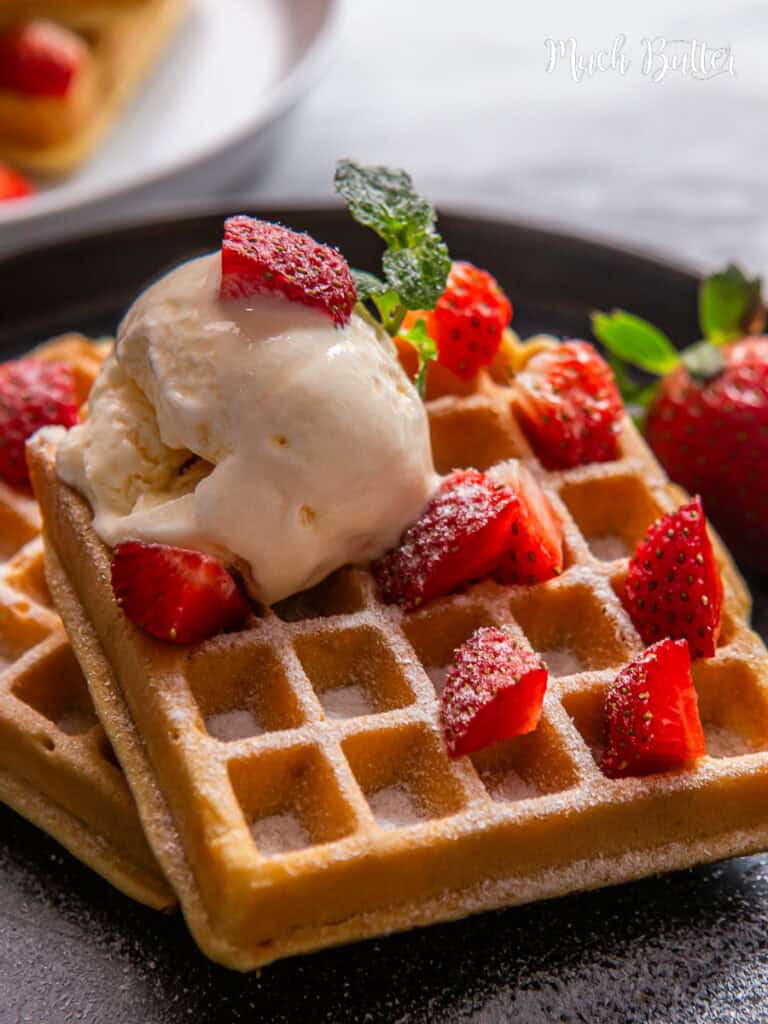 This simple Belgian waffle recipe is your answer! it has a crispy exterior and a light, fluffy interior! Top the waffles with berries, ice cream & sugar!