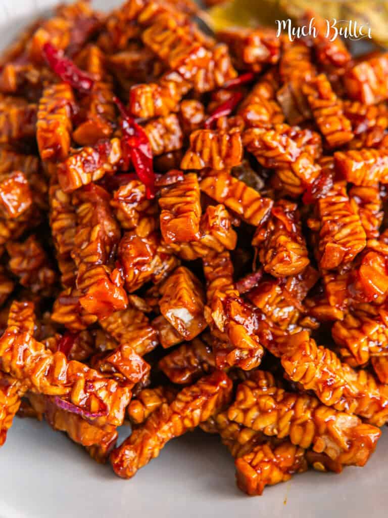Craving a flavor blast? Make Indonesian Tempeh Orek! Crispy tempeh in sweet & spicy homemade kecap manis. Easy, protein-packed, 1-pan wonder!