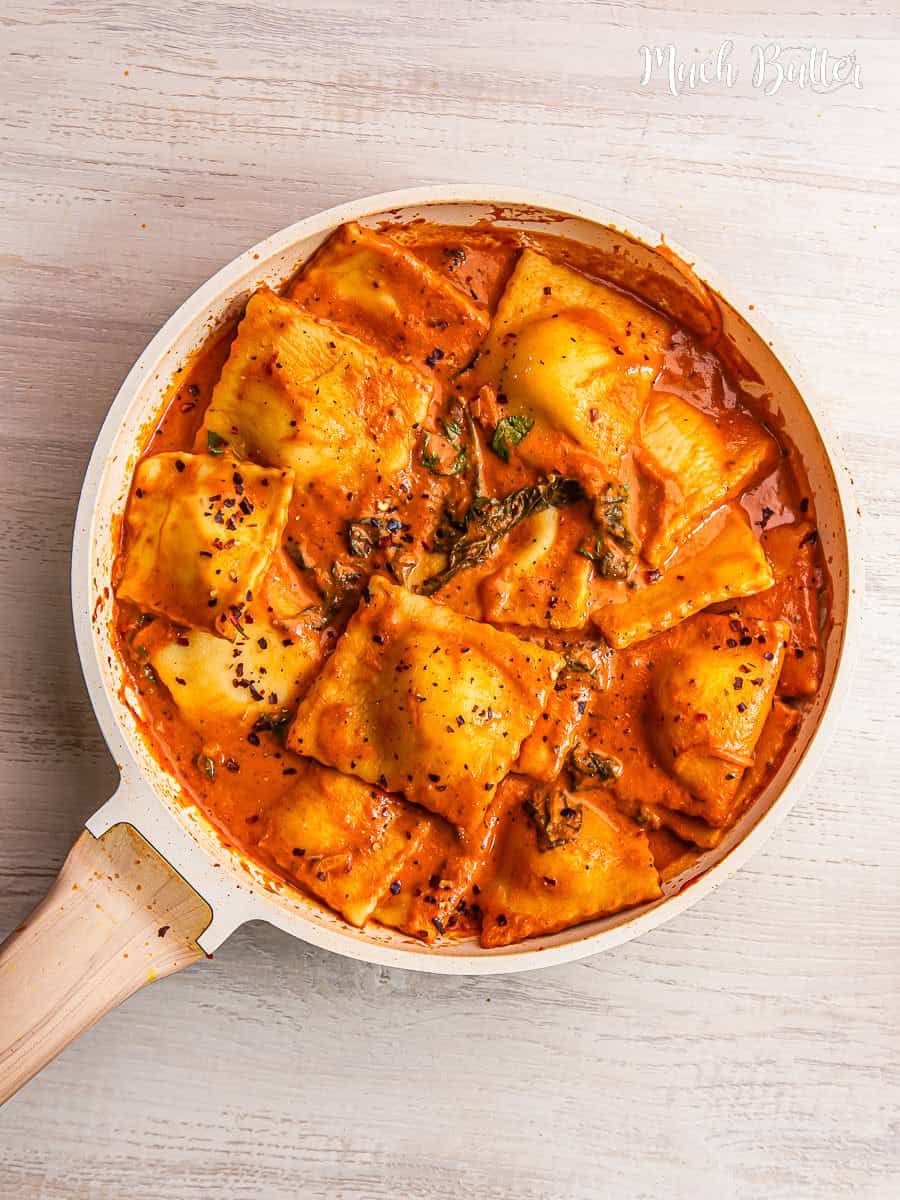 Ravioli with Creamy Tomato Spinach Sauce - Much Butter