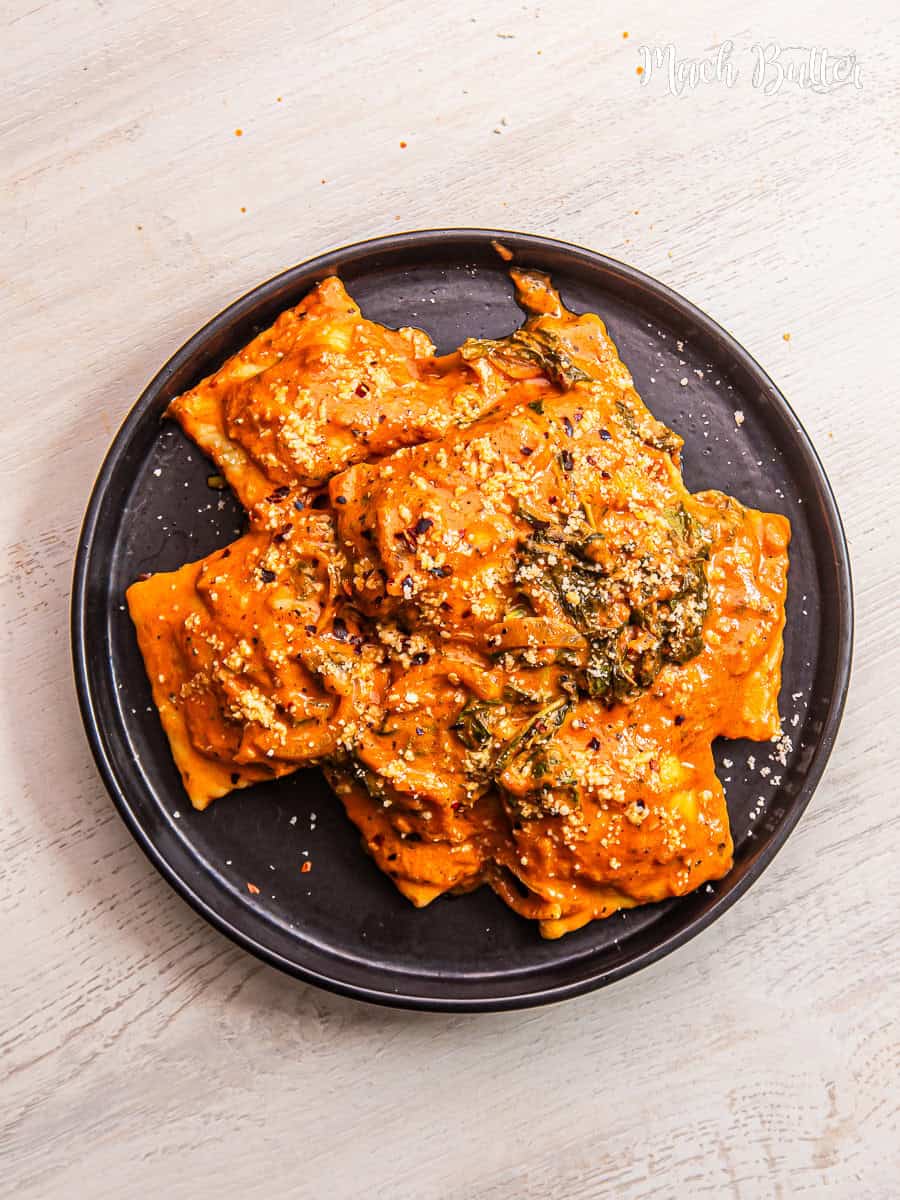 Ravioli with Creamy Tomato Spinach Sauce - Much Butter