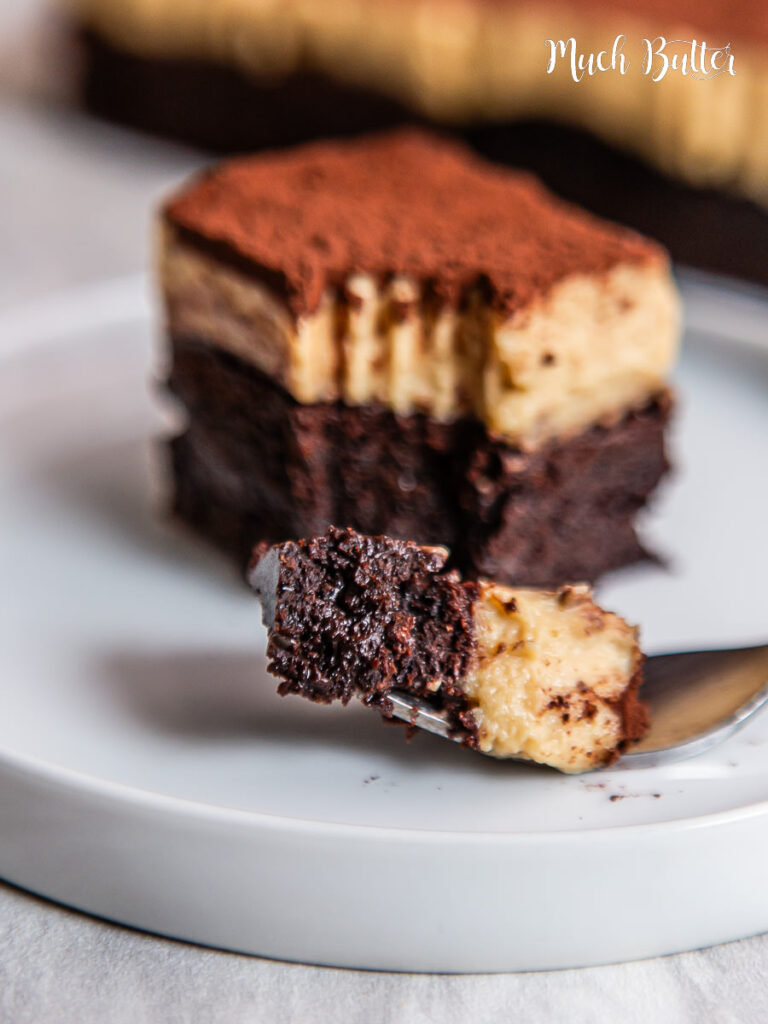 Tiramisu Brownies is a dessert that combines tiramisu elements such as coffee, mascarpone, and cacao powder into a layer of brownies.