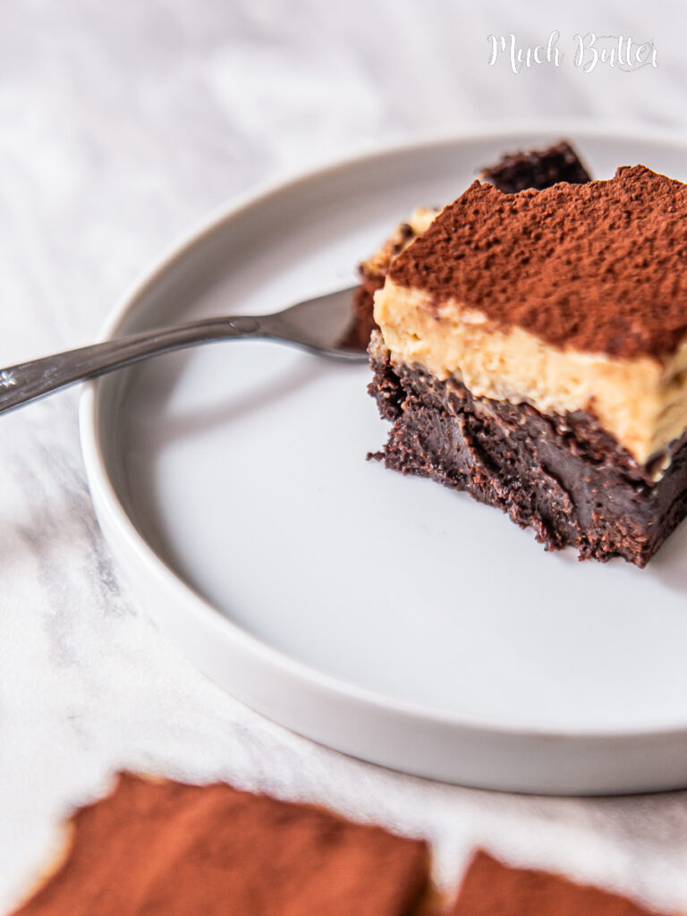 Tiramisu Brownies is a dessert that combines tiramisu elements such as coffee, mascarpone, and cacao powder into a layer of brownies.