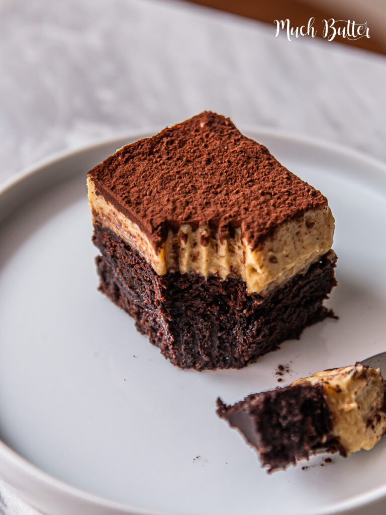 Tiramisu Brownies is a dessert that combines tiramisu elements such as coffee, mascarpone, and cacao powder into a layer of brownies.