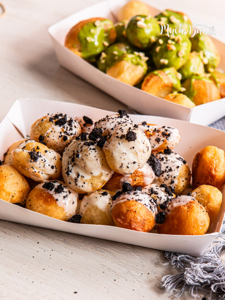 Try Loukoumades, A Greek bite-size donut with crispy on the outside, fluffy on the inside, and soaked in sweet honey syrup.
