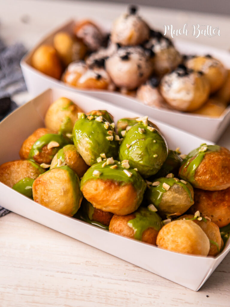 Try Loukoumades, A Greek bite-size donut with crispy on the outside, fluffy on the inside, and soaked in sweet honey syrup.